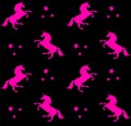 Seamless pattern of neon pink unicorn on black Royalty Free Stock Photo