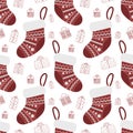 Seamless pattern for the New Year. Vector hand-drawn illustration of a Christmas red sock for gifts.