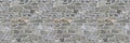 Seamless pattern of an old wall built with irregularly shaped stone blocks - Useful for renderings applications Royalty Free Stock Photo