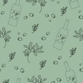 Seamless pattern with olives, olive oil, olive branch on green background in doodle style Royalty Free Stock Photo