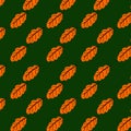 Seamless pattern of orange autumn leaves on green background. Vector illustration can be used as design element on Royalty Free Stock Photo