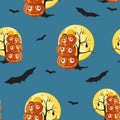 Seamless pattern with orange Halloween pumpkins carved faces, moon and bat on dark blue background. Royalty Free Stock Photo