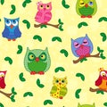 Seamless pattern with ornamental owls over yellow