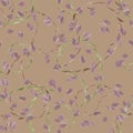 Seamless pattern with paisley and violet leaves on a deep beige background. Watercolor