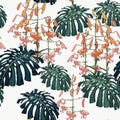Seamless pattern with palm monstera leaves and tropical lilies flowers. Royalty Free Stock Photo