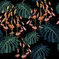 Seamless pattern with palm monstera leaves and tropical lilies flowers.