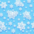 Seamless pattern with paper snowflakes on blue background for Your Christmas and New Year holiday design