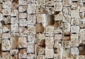 Seamless pattern of partially destroyed masonry wall of limestone blocks. Background texture of weathered ancient brick