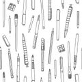 Seamless pattern with pens and pencils Royalty Free Stock Photo