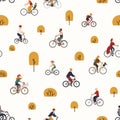 Seamless pattern with people riding bikes in autumn park with trees. Backdrop with men and women on bicycles. Vector Royalty Free Stock Photo