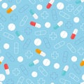 Seamless pattern of pills. Blue medical background