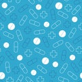 Seamless pattern of pills. Blue medical background.