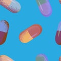 Seamless pattern of pills of different colors with noise.