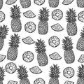 Seamless pattern of pineapples and pieces of pineapples on black background.