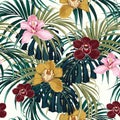 Seamless pattern, pink burgundy yellow orchid flower and green exotic palm monster leaves.