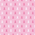 Seamless pattern with pink cancer ribbons. Breast Cancer Awareness Month pink and white background. Cancer ribbon symbol. Cancer Royalty Free Stock Photo