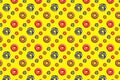 Pattern of pink and chocolate donuts on bright yellow background top view tasty doughnuts backdrop colorful sweet dessert Royalty Free Stock Photo