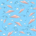 Seamless pattern with pink paper airplanes and clouds Royalty Free Stock Photo