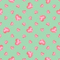 Seamless pattern of pink watercolor hearts of different size, on a mint background.