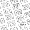 Seamless pattern, plastic cassette, audio tape with different music. Hand drawn contour background, retro style. Royalty Free Stock Photo