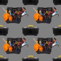 Seamless pattern of plastic tool box with an orange construction protective helmet and various hand tools Royalty Free Stock Photo