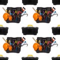 Seamless pattern of plastic tool kit box with an orange construction protective helmet and various hand tools isolated on a white Royalty Free Stock Photo