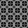 Seamless pattern with polka dots of three sizes in black and white