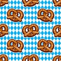 Seamless pattern with pretzels for Oktoberfest on Bavarian flag background. Royalty Free Stock Photo