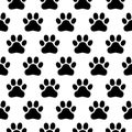 Seamless pattern of print of dogs paws on a white background Royalty Free Stock Photo