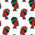 Seamless pattern from profile African woman with headdress in national hues turned in different way
