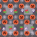 Seamless Pattern with Pumpkins, Spiders, Ghosts, and Candy Royalty Free Stock Photo