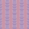 Seamless pattern of purple towers with white rings, on a pink background, Royalty Free Stock Photo