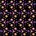 Seamless pattern with rainbow shiny circles on a black background. Balls of different sizes of purple, pink and orange on a black Royalty Free Stock Photo