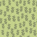 Seamless pattern with random little leaf branches silhouettes print. Light green background