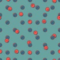 Seamless pattern of red and blue smiley dots.