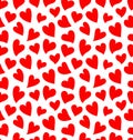 Seamless pattern with red hearts on the white background. Royalty Free Stock Photo