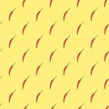 Seamless pattern of red hot chili pepper on a yellow background. Top view