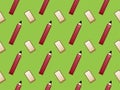 Seamless pattern of red pencils and white erasers Royalty Free Stock Photo