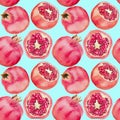 Seamless pattern of red pomegranates on blue background isolated close up, whole and cut pink pomegranate with seeds ornament