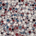 Seamless pattern of red white and blue circles packed tightly into sophisticated print