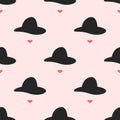 Seamless pattern with repeating silhouettes of women`s lips and hats. Repeated feminine print. Royalty Free Stock Photo