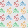 Seamless pattern with retro big wheel bicycles. multicolored antique old bicycle with big wheels Penny-farnet. Royalty Free Stock Photo