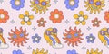 Seamless pattern with retro 70s groovy elements, simple funky hippy symbols. Colored daisy flowers. stars, sun and emoji Royalty Free Stock Photo