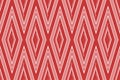 Seamless pattern with rhombuses in red and white colors Royalty Free Stock Photo