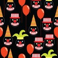 Seamless pattern with round clown faces with shining eyes wearing party hats