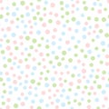 Seamless pattern with round dots. Pink, blue, green circles scattered on white background. Royalty Free Stock Photo