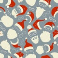 Seamless pattern of Santa hats, beards and eyeglasses. Royalty Free Stock Photo