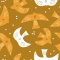 Seamless pattern with scandinavian style white birds on mustard. Creative monochrome bird texture. Great for fabric, textile