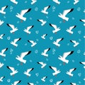 Seamless pattern: seagulls and doodles on a blue background.