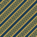 Seamless pattern with shiny gold and silver chains isolated on blue background for fabric. Royalty Free Stock Photo